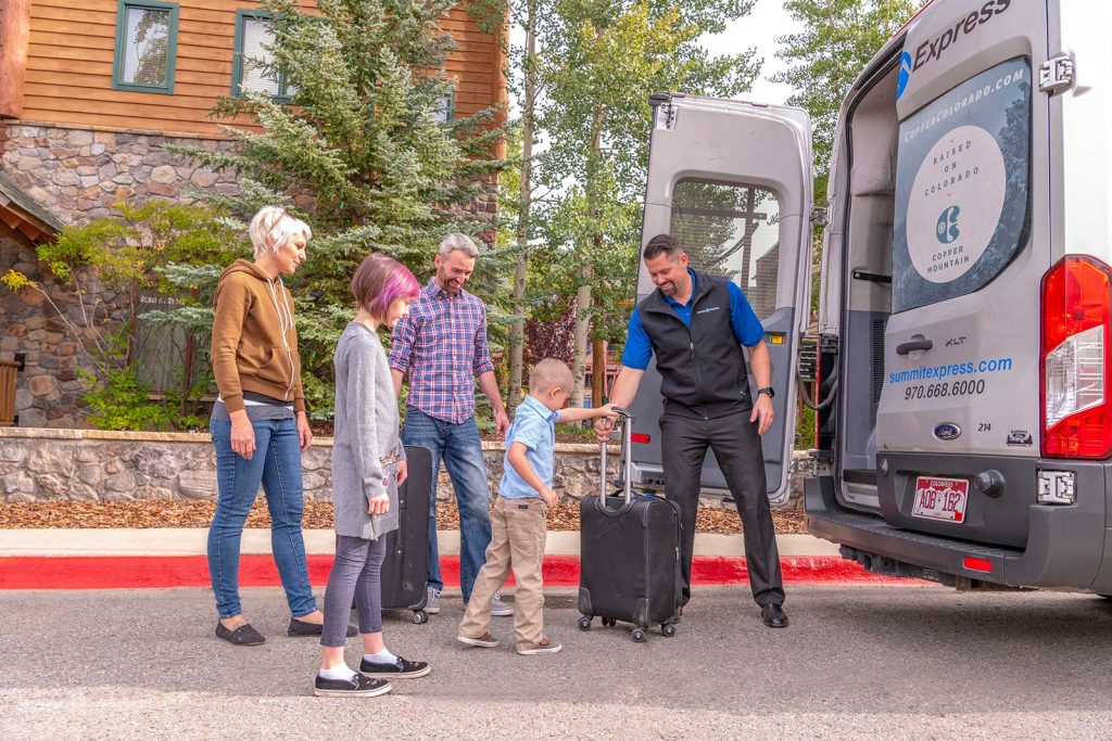 Summit Express Keystone family loading luggage